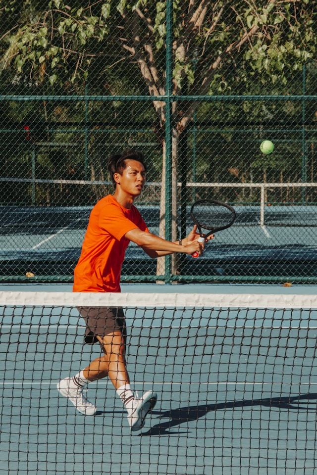 Dedicated tennis players at a local club showing camaraderie and commitment to regular play